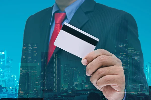 Businessman holding blank smart card — Stock Photo, Image