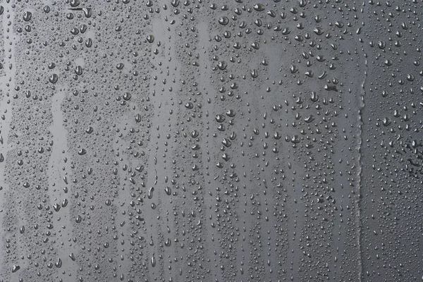 Gotas de água no fundo preto — Fotografia de Stock