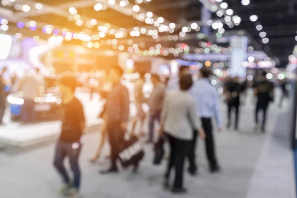 Abstraktes verschwommenes Ereignis mit Menschen als Hintergrund — Stockfoto