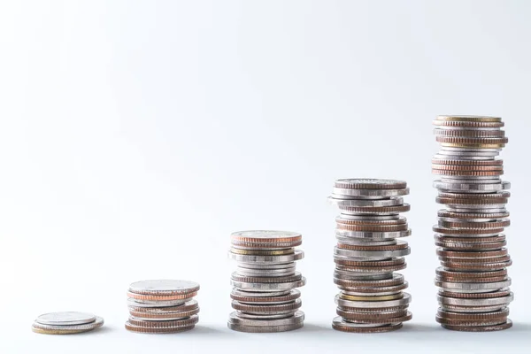 Pila de monedas sobre fondo blanco — Foto de Stock