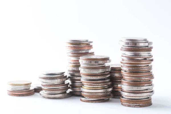 Pila de monedas sobre fondo blanco — Foto de Stock