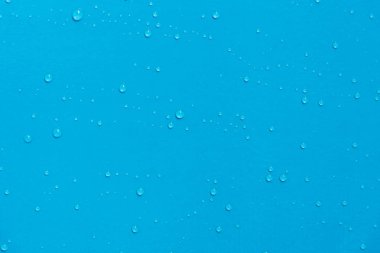 Mavi Arkaplanda Su Damlaları