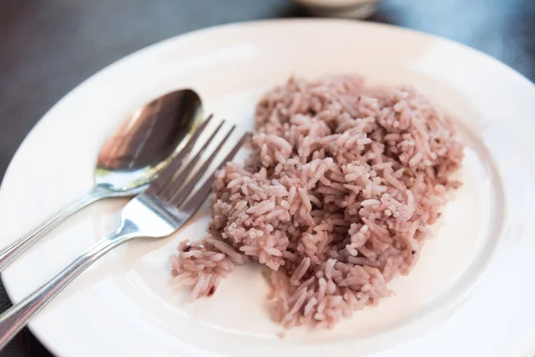 Bagas de arroz em prato branco — Fotografia de Stock
