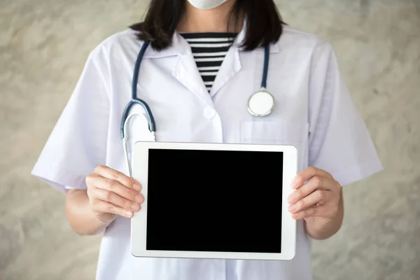 woman doctor showing  tablet screen