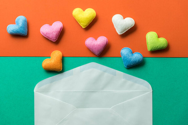 mini heart splash out from white envelop, valentine concept
