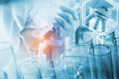 bilim adamı ya da bir kan kan testi tüp içine bırakarak doktor