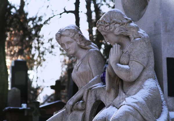 Old cemetery with desperate statues — Stock Photo, Image