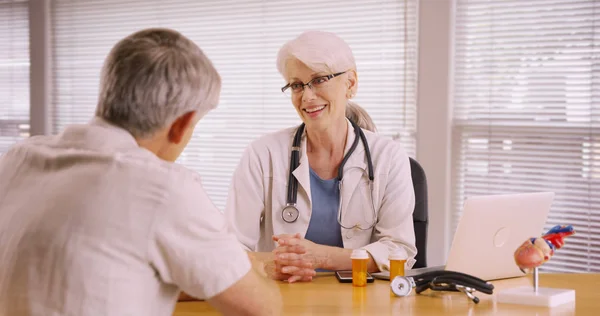 Friendly Woman Doctor Prescribing Medication Elderly Patient — Stock Photo, Image