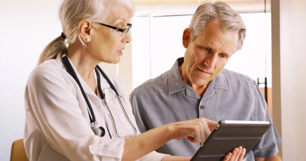Senior Doctor Expressing Health Concerns Elderly Man Patient — Stock Photo, Image