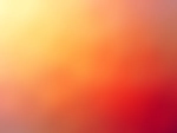 Abstract gradient red orange yellow colored blurred background