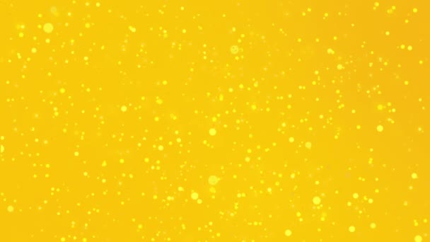 Fondo amarillo dorado con luces brillantes de colores — Vídeos de Stock