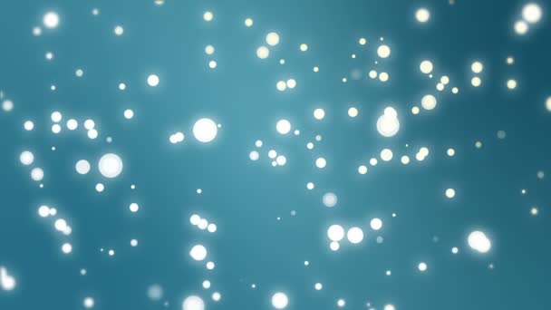 Glowing white yellow sparkles on teal blue background — Stock Video