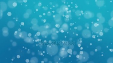 Turkuaz mavi bokeh arka plan ışık parçacıkları yüzen ile animasyon.