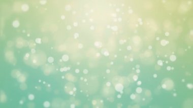 Parlak mavi yeşil sarı arka plan titreşen bokeh ışıkları ile.