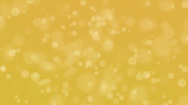 Parlayan ışık parçacıkları ile şenlikli altın sarısı bokeh arkaplan.