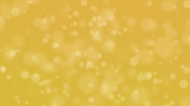 輝く光の粒子と祭のアニメーション黄金の黄色のボケの背景 — ストック動画