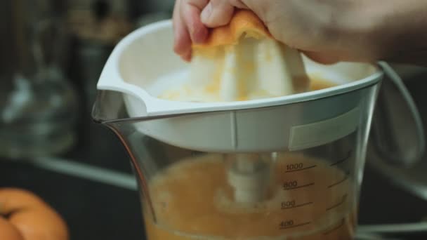 Woman makes orange fresh — Stock Video