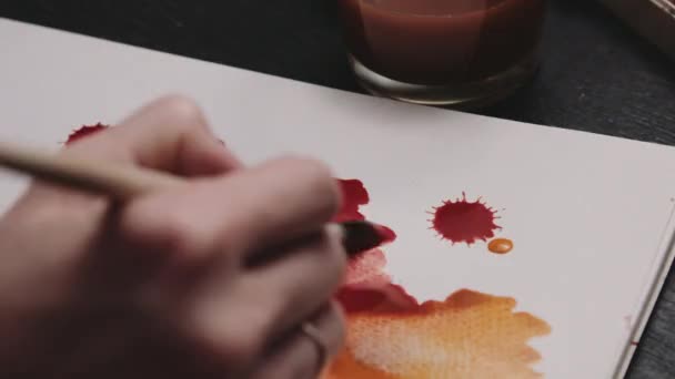 Close up shot of watercolors on paper — Stock Video