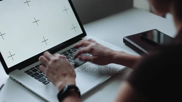 Back view of scientist working on laptop — Stock Video