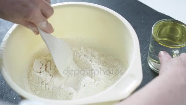 Female hands sifts the flour — Stock Video