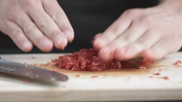 Male hands making mincemeat for burger — Stock Video