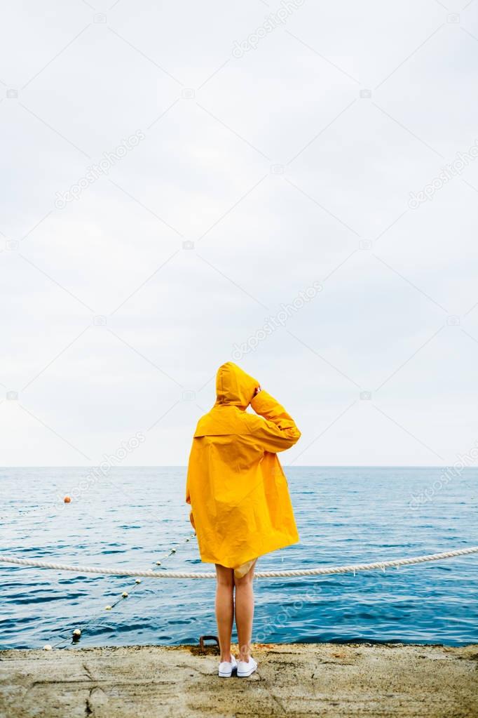 Anonymous girl on waterfront