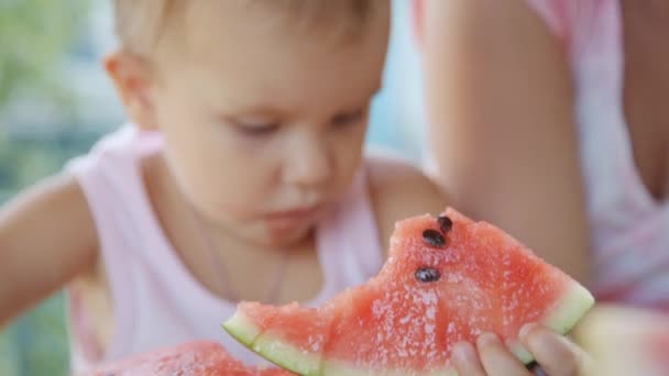 Child eating watermelon — Stock Video