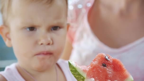 Child eating watermelon — Stock Video