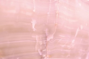 Aydınlatılmış mermer akik. Yatay görüntü. Sıcak pembe renkler. Güzel yakın plan