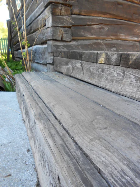 Old wooden porch, whipped from planks — Stock Photo, Image