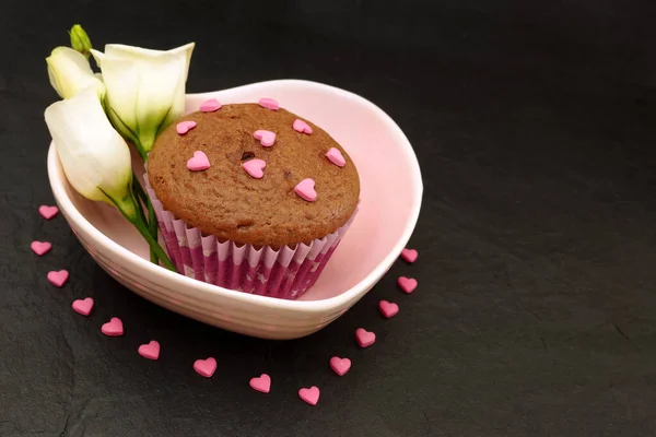 Chocolate Muffin Cake Pink Plate Decorated Sugar Hearts Black Table — Stock Photo, Image