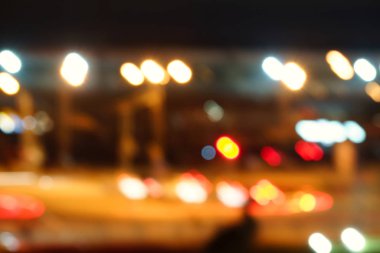 Gece şehrinin ışıkları. Bulanık görüntü. Soyut arkaplan