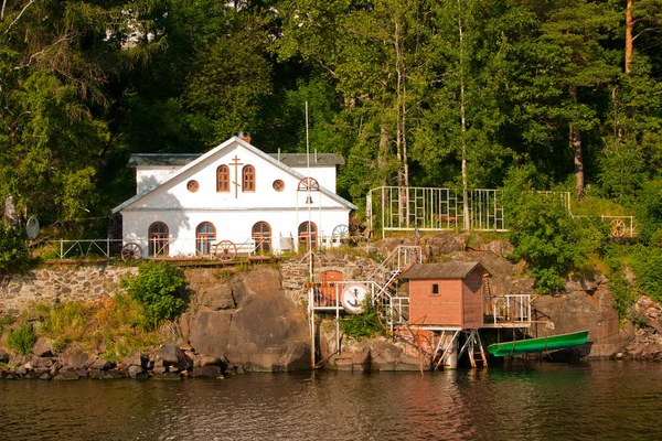 The water pumping station and the house. Karelia Valaam Island.