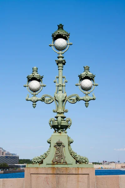 Trinity Bridge. Lighting trehrozhkovy lantern. Saint Petersburg Russia.