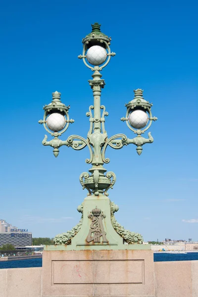 Trinity Bridge. Lighting trehrozhkovy lantern. Saint Petersburg Russia.