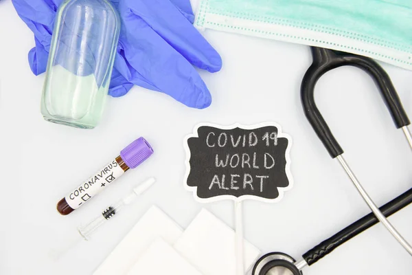 Text phrase: COVID 19, WORLD ALERT, with medical equipment on white background. Novel coronavirus 2019-nCOV, MERS-Cov middle East respiratory syndrome coronavirus.