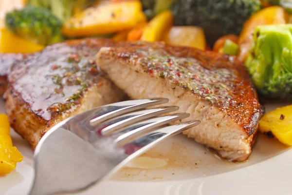 Eating Pork Fillet Steak Roasted Vegetables — Stock Photo, Image