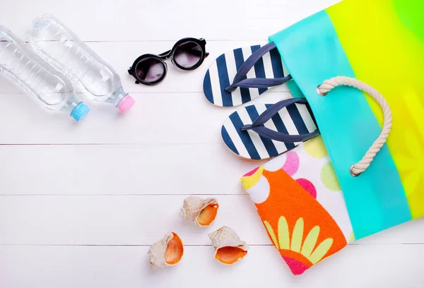 Fashionable beach accessories on a white background — Stock Photo, Image