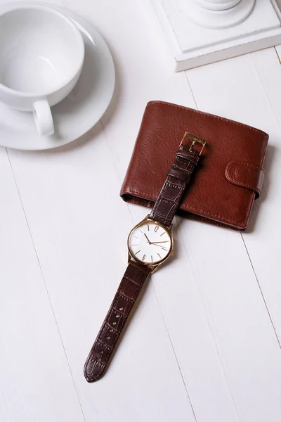 Fashion. watches, wallets and a cup on a white background — Stock Photo, Image