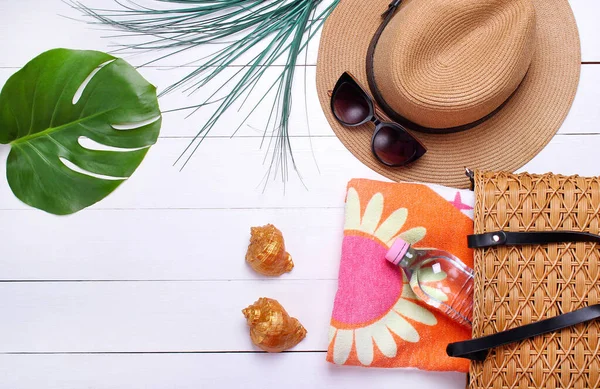 fashion. fashionable straw bag and straw hat on a white background