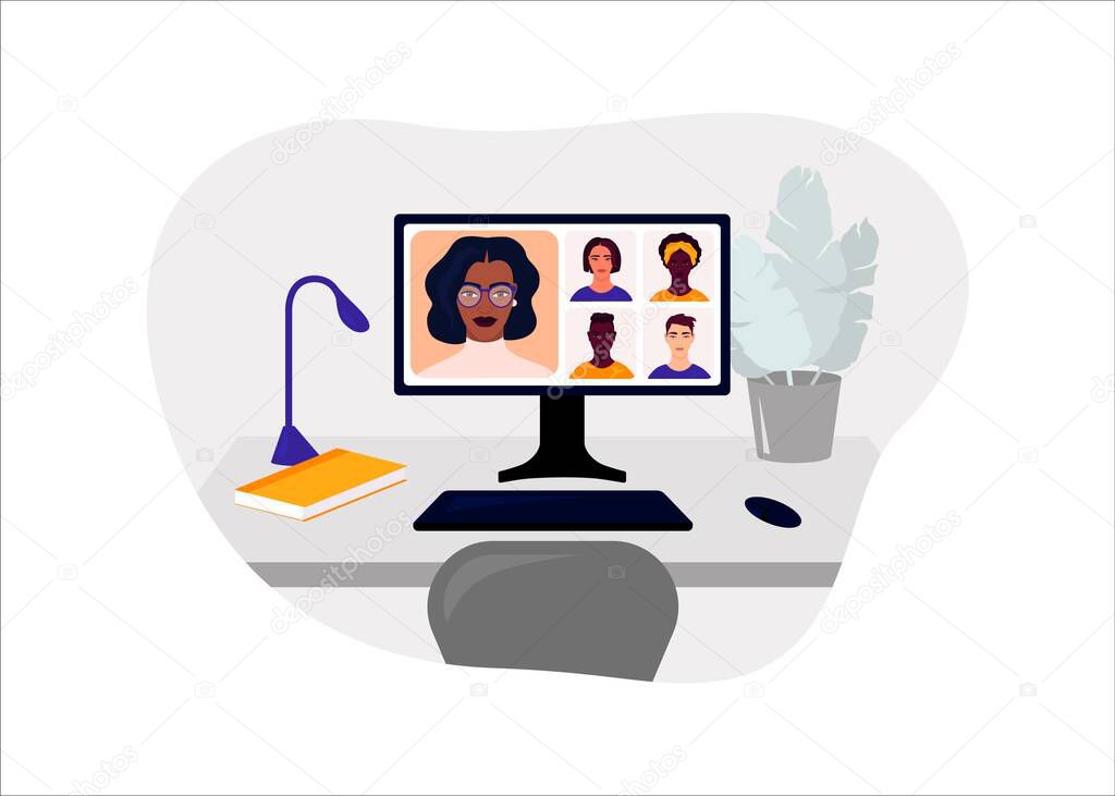 The computer is on the table on the screen shows an online class. Organization of the workplace. Distance e-learning in online school concept of coronavirus 2019-nCoV.