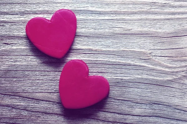 Two red heart on a wooden old background. Romantic card. A declaration of love in vintage style. — Stock Photo, Image