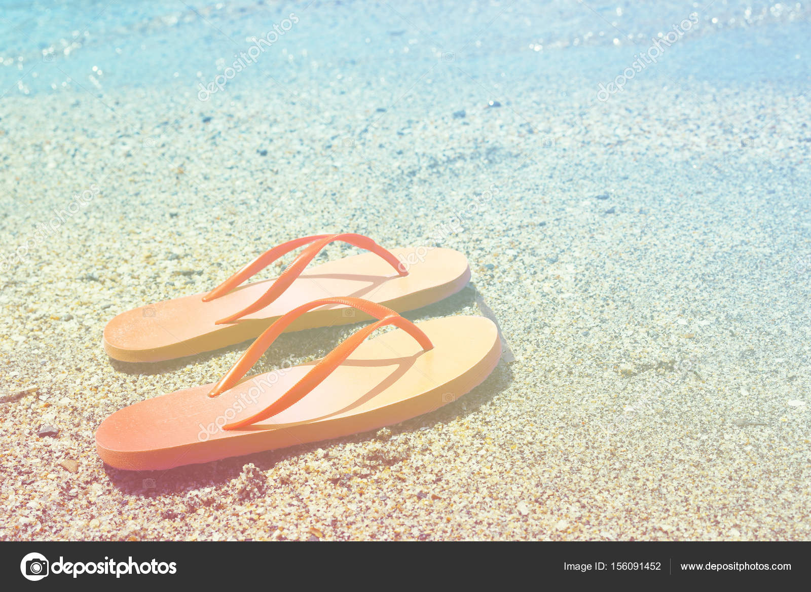 flip flops on the beach