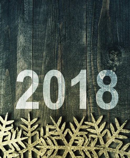 Happy New Year 2018 on a wooden texture background in vintage style. — Stock Photo, Image