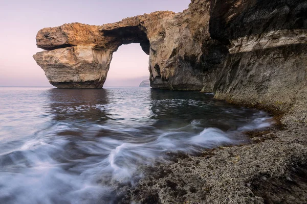 A beautiful early morning photograph of the Azure Window rock arch on the island of Gozo, Malta.