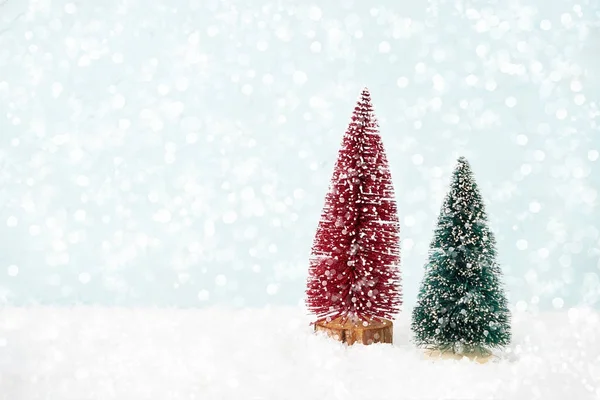 Christmas decoration. Christmas greeting card. Christmas fir tree, bokeh, snow. Copy space