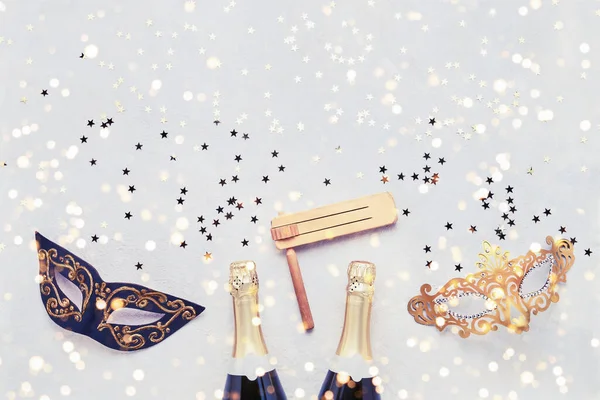 Two Champagne Bottles Carnival Mask Gragger Light Background Flat Lay — Stock Photo, Image