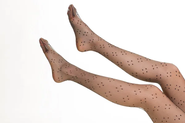 Kousen met noppen op vrouwen benen. — Stockfoto