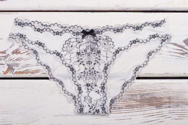 Delicate silk panties with lace insert. clipart