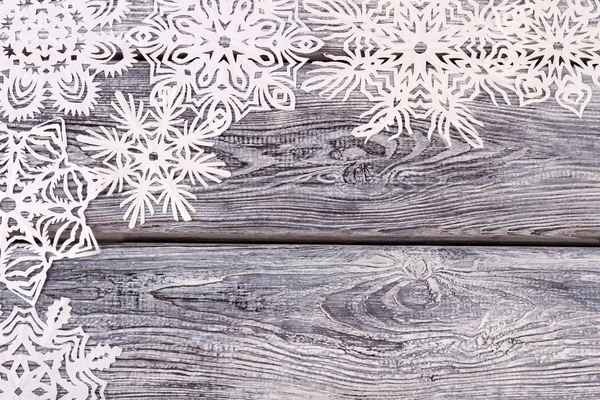 Piękny ażurowe białe płatki śniegu na tle archiwalne. — Zdjęcie stockowe